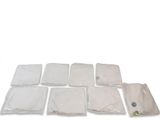 many pieces of plastic on a white surface
