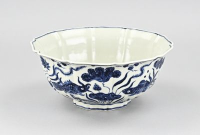blue and white porcelain bowl with floral design on it