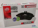 photo d'une boîte contenant des plaquettes de frein pour voiture