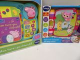 two children ' s electronic toys in the box on the table