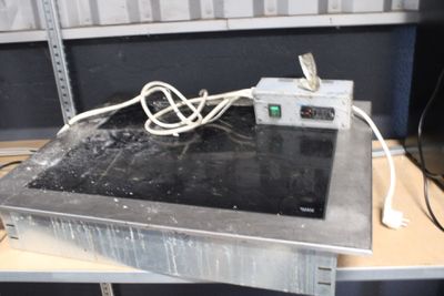 an image of a metal table with wires on top of it