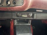 a car radio in the center of the dashboard