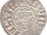 une pièce d'argent portant l'image d'un homme
