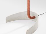 a close up of a lamp on a table with a cord attached to it