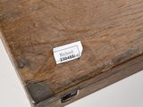 a wooden box with a label on it