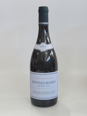a bottle of wine that is sitting on a table
