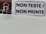 a sign that says non teste non monte on it
