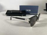 christian dior sunglasses with box and case on a white table