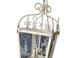 an image of a white lantern hanging from the ceiling