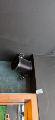 a picture of a camera mounted to the ceiling