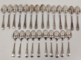 a lot of spoons that are sitting on a table