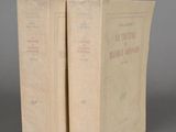pair of two books sitting on top of each other on a table