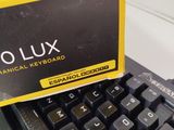 a yellow box on top of a black keyboard