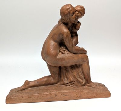 statue of a woman sitting on a rock with her hand on her chin