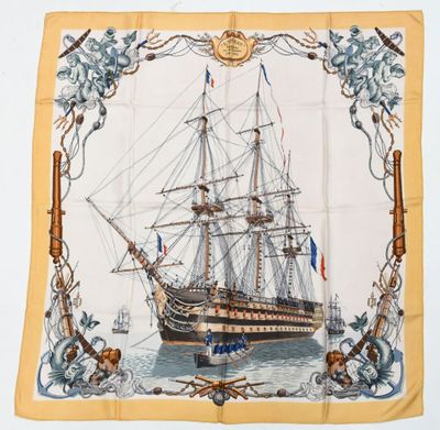 an image of a square scarf with a ship on the front of it