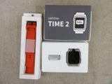 a box with a watch inside of it on a table
