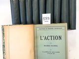 six livres sont alignés sur une surface blanche