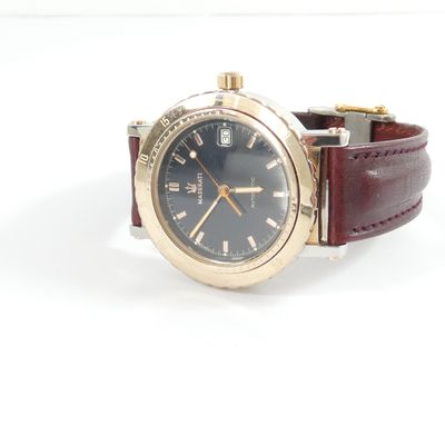 an image of a wrist watch with a blue dial