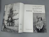 an open book with a drawing of a ship and a picture of a ship