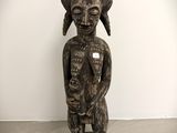 an image of a statue of a woman holding a baby