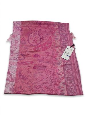 a close up of a pink scarf with a tag on it