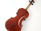 an antique violin on a white background