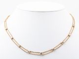 a gold chain necklace with a star pendant and a star charm