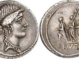 a silver coin with an image of a woman on it
