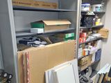 a room with a lot of boxes and boxes on the shelves