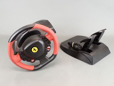 ferrari steering wheel with pedals and charging dock for the xbox
