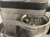 a mixer that is sitting on a counter in a kitchen