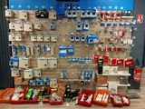 many different types of electronics on display in a store