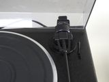 a turntable with a record player attached to it