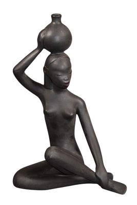statue of a woman with a pot on her head