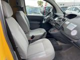 the interior of a car with a steering wheel and a seat in it