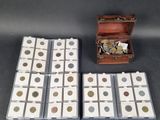 two boxes of coins and a wooden box with coins in them