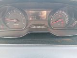 a close up of a car dashboard with a speedometer and gauges