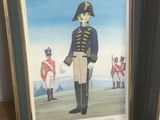 two framed pictures of a man in a military uniform and a soldier in a uniform