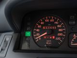 a close up of a car dashboard with a speedometer