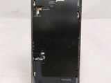a picture of a broken cell phone on a table