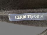 a close up of a black hat with a cerruti jeans label