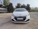 a white car that is parked in a parking lot