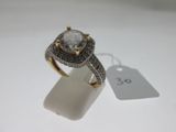 an image of a diamond ring with a price tag on it