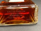 chanel eau de parfum perfume bottle on a table