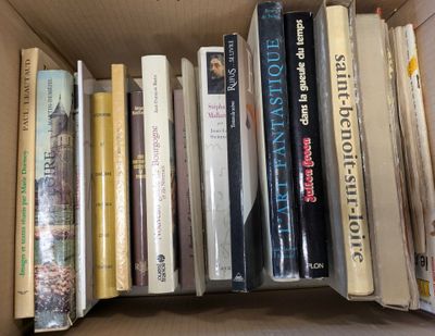 a box full of books that are sitting on a table