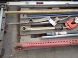 a lot of tools that are laying out on the floor