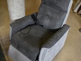 a recliner that is sitting in the middle of a room