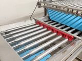 an image of a conveyor belt in a factory with a conveyor belt on it