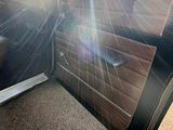a car door with the sun shining through the window