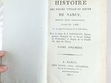 someone is holding a book open to a page with a title in it